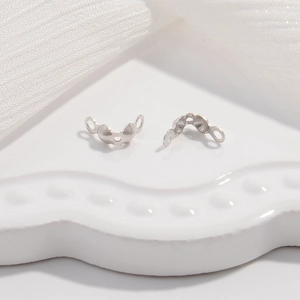 Macro shot of S925 sterling silver double-ear clasp connectors for DIY jewelry making
