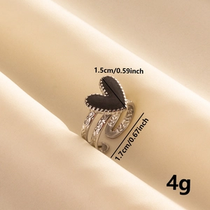 Detail shot of a 304 stainless steel heart ring with size and weight dimensions
