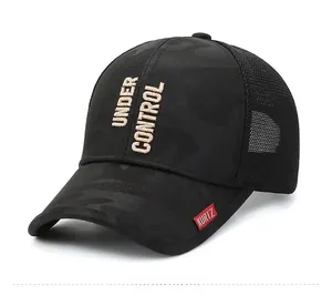 Detail of black camo baseball cap with mesh panels and vertical khaki embroidery