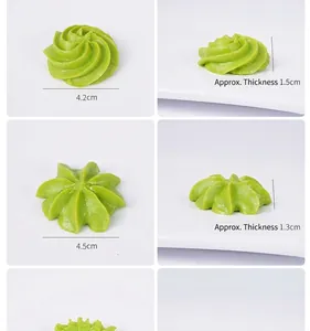 Detailed view showing the thickness and diameter of artificial green cookie models