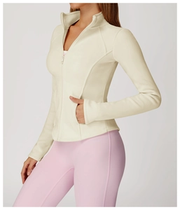 Detailed side view of slim fit cream fleece jacket with stand collar and zipper