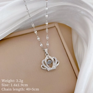 Silver crown necklace pendant in jewelry box with size and weight details displayed