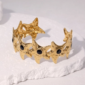 Adjustable 18k gold plated starfish cuff bracelet with black enamel star centers