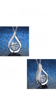 Macro detail of 1 carat moissanite teardrop pendant with shiny S925 silver finish