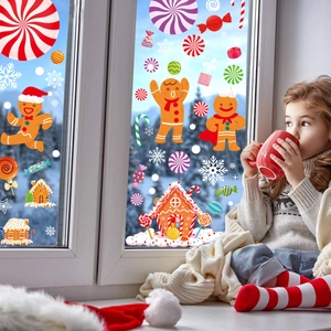 Christmas gingerbread man and snowflake window decals for festive glass decoration
