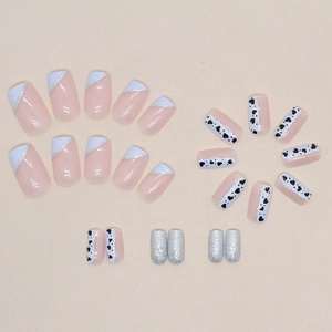 Blue and white French press-on nails with pink base, black hearts and silver glitter