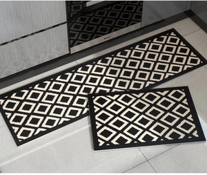 Kitchen floor mats set of 2 in black and beige diamond pattern on kitchen tiles