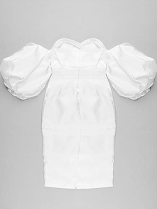 Detailed close-up of white off-shoulder satin dress showing puff sleeves and fabric texture