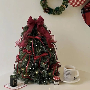 Mini PE artificial Christmas tree with red velvet bows and LED lights for desktop decor