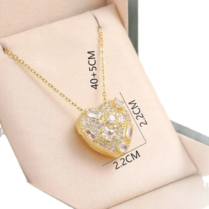 Gold plated titanium steel heart pendant necklace with zircon stones in a jewelry box