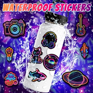 Waterproof neon stickers with various glowing icons like guitar and camera on a water flask