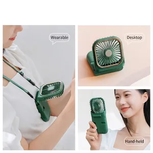 Portable folding USB fan in dark green showing neck-hanging, desktop, and handheld modes