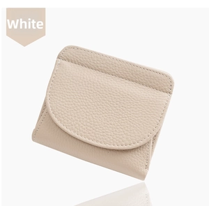 Close-up of small white leather wallet with fine lychee texture and stitching details