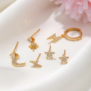 18K gold plated earring set with stars moon lightning motifs and white zircon stones