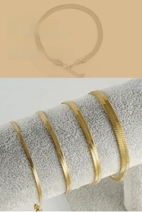 Detailed comparison of four different widths of golden herringbone blade chain bracelets