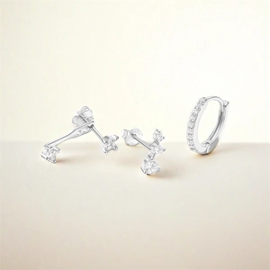 Detailed macro view of S925 sterling silver earring set with sparkling zircon stones
