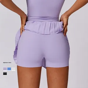 Jupe-short de tennis plissée violette pour femme avec short intégré pour le sport et fitness