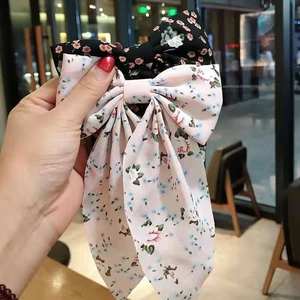 Floral print bow hair clips with long streamers in black and pink chiffon fabric