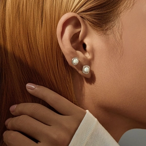 Elegant S925 sterling silver stud earrings featuring opal stones and halo crystal accents