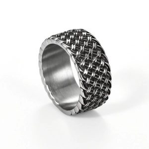 Vintage stainless steel ring for men with industrial woven texture on a white background