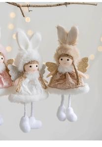 Detail of plush angel girl dolls with lace dresses and rabbit ears for Christmas decor