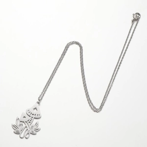 Minimalist silver mushroom pendant necklace with celestial star and moon leaf design