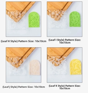 Macro view of four assorted leaf pattern texture stamps for clay and fondant decorating
