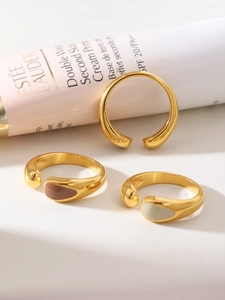 Artistic teardrop rings with colorful enamel glaze on polished gold stainless steel