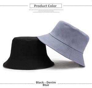 Detail view of black and denim blue cotton bucket hats with parallel stitching details