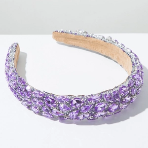 Macro shot of purple baroque headband featuring crystal rhinestones and silver claw settings