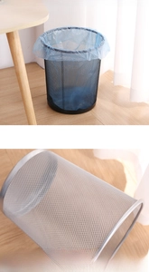 Close-up of breathable mesh design on black and silver round metal waste bins