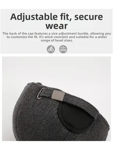 Detail of adjustable metal buckle and elastic strap on winter baseball cap for men