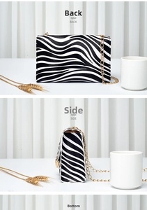 Close-up of zebra pattern crossbody bag with gold chain and side view of the flap