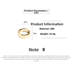 Detail of a large 8cm golden ABS resin geometric ring bracelet weighing 53.9g