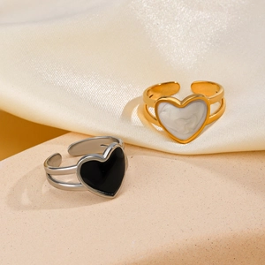 Fashionable heart-shaped 18K gold plated stainless steel open rings on silk fabric