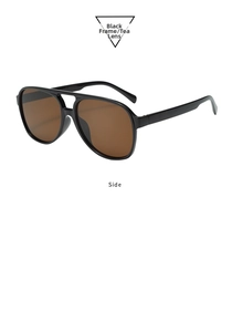 Side view of retro double bridge aviator sunglasses with black frame and tea lenses