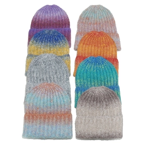 Colorful gradient knit beanies with ribbed texture and folded cuffs for autumn and winter