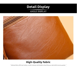 Close-up of brown litchi pattern leather texture and high-quality zipper detail