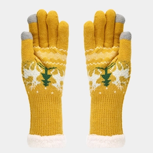 Detail of yellow Christmas touch screen gloves with knit snowflake and tree patterns