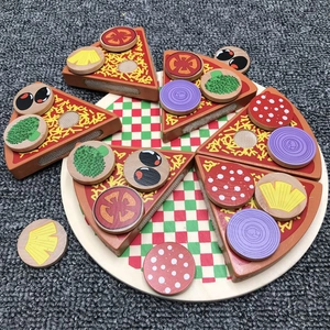 Detailed view of wooden pizza toy set with velcro slices and assorted veggie toppings