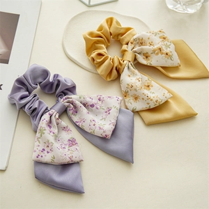 Floral print double bow scrunchies set in purple and yellow satin fabric for women