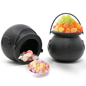 Halloween black witch cauldron candy buckets set with colorful sweets on white background