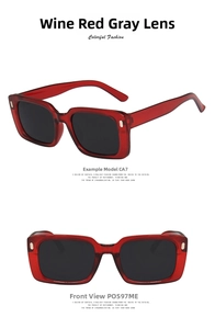 Detail of wine red rectangle sunglasses with gray lenses and metallic rivets