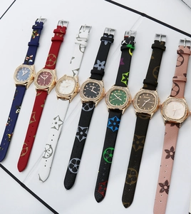 Detailed macro view of seven square quartz watches with diamond bezels and patterned straps