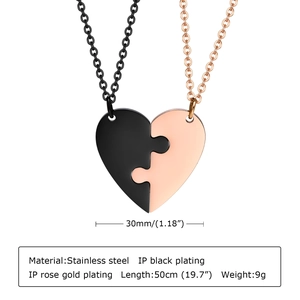 Detail of heart puzzle necklaces in black and rose gold with 30mm pendant dimensions