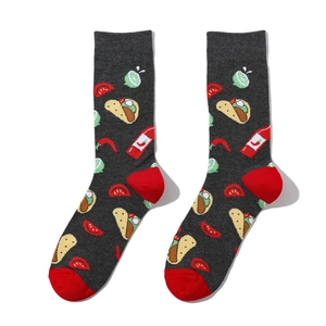 Detail of dark grey crew socks with Mexican taco and chili patterns and red heel accents