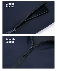 Close-up of smooth zipper and side pocket with mobile phone on navy jacket