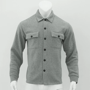 Detail of grey men's casual slim fit jacket with chest pockets and textured fabric