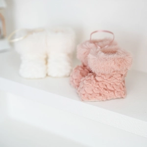 Pink and white plush Christmas boot ornaments for tree decoration with fluffy texture