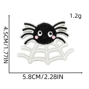 Detail of black spider and white web embroidered patch with precise size measurements